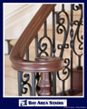 Cherry Volute Iron Balusters