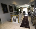 Oak Hand Rail With Paint Grade Balusters On Curb Wall